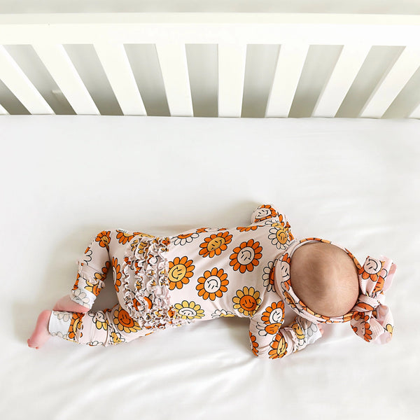 Margot Ruffle Zip Onesie